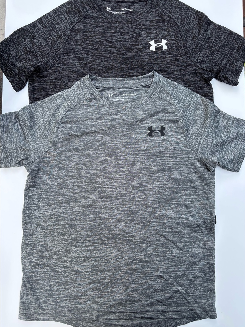 Under Armour kids short sleeve heather grey and charcoal Performance Tee bundle